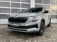 Skoda Karoq 1.5 TSI DSG Sportline NAV AHK MATRIX 5JGAR bei Autohaus Landmann & Maier OHG
