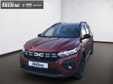 Dacia Jogger Extreme Hybrid 140 *KLIMA* - mit Hybrid-Antrieb: Braun, Van