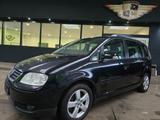 Volkswagen Touran 2.0 TDI Automatik Highline Xenon/Navi - Volkswagen Touran aus 2006: Highline