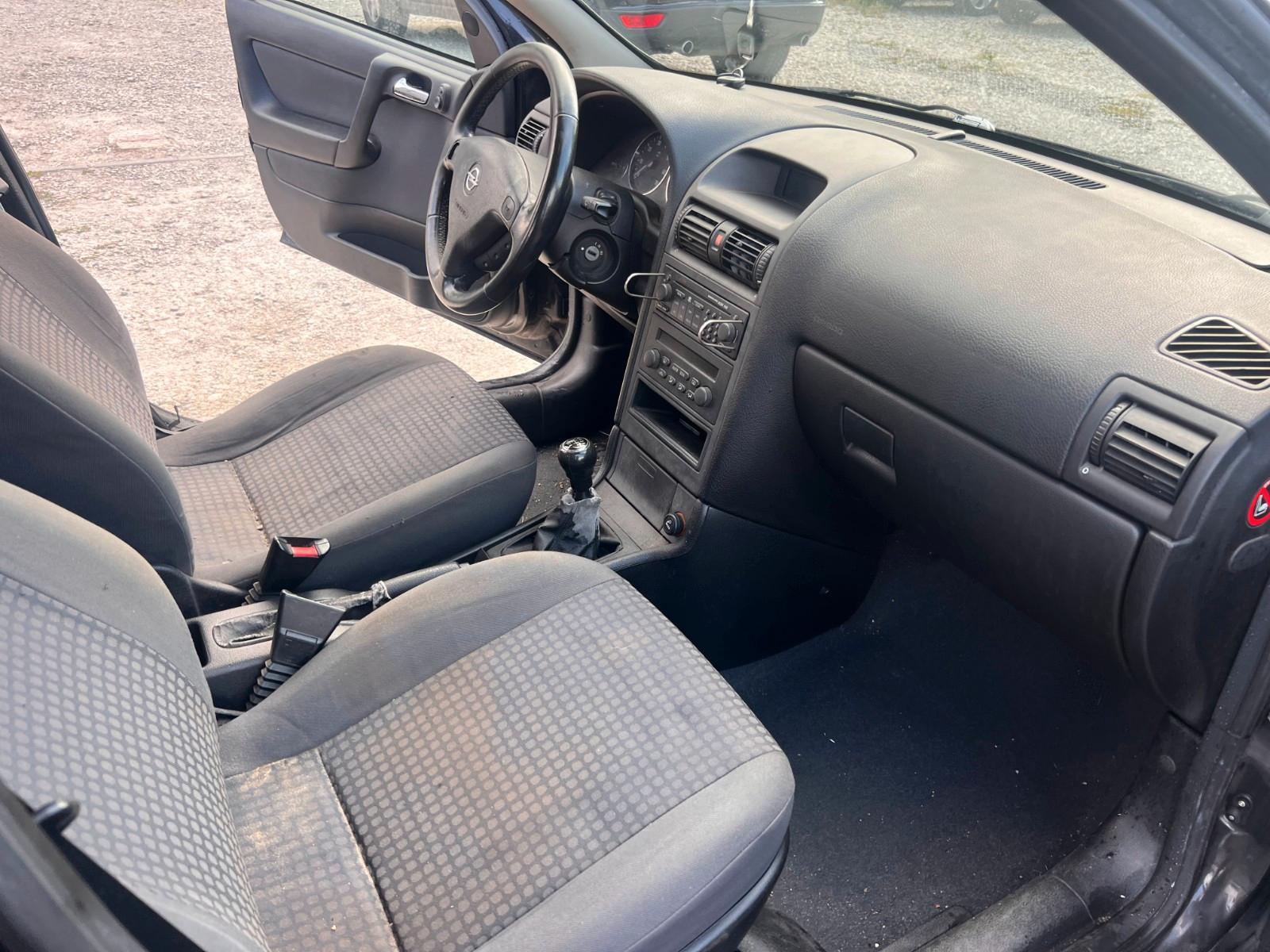 Opel Astra 2004 — photo 10