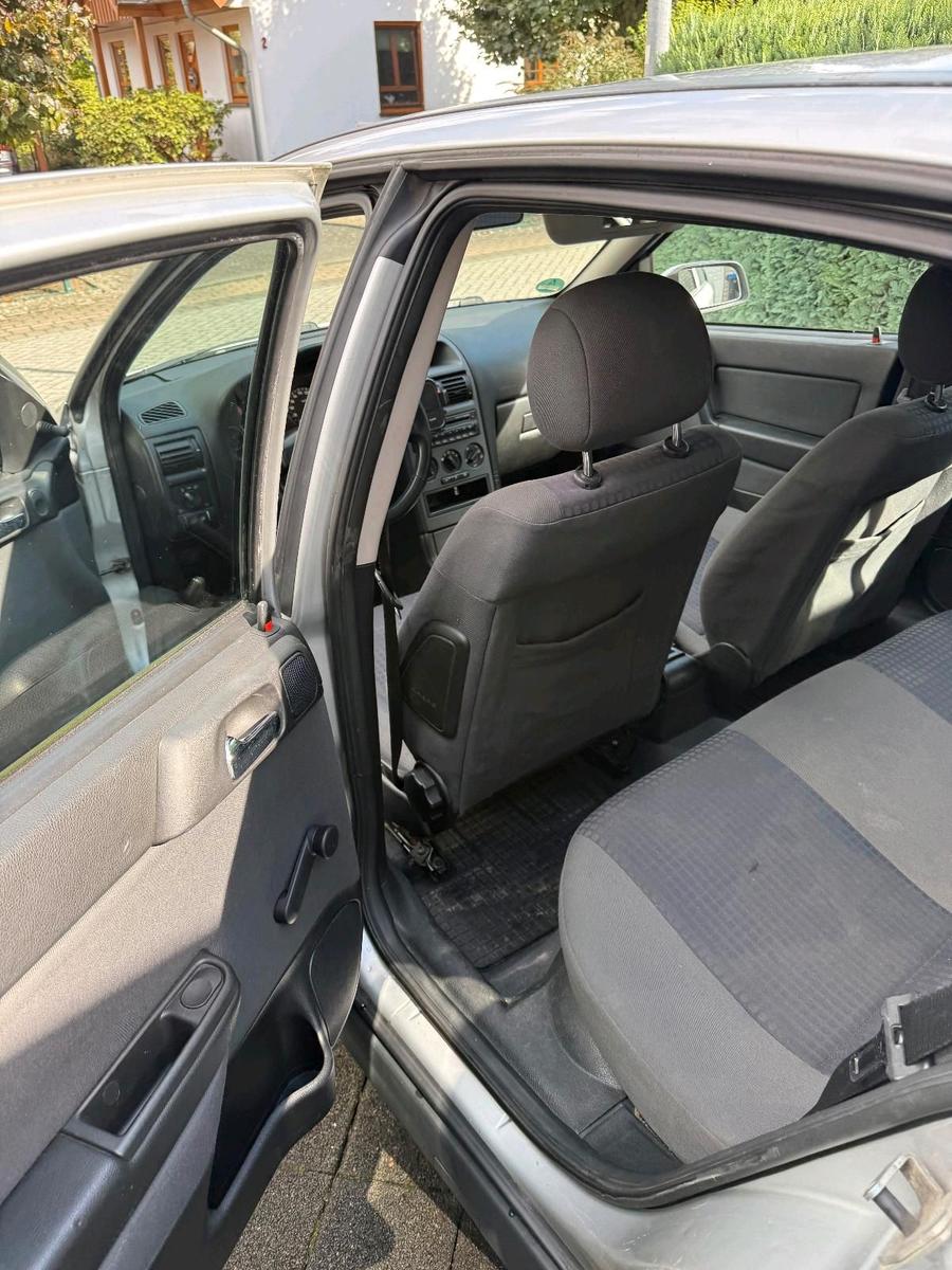 Opel Astra 2004 — photo 9