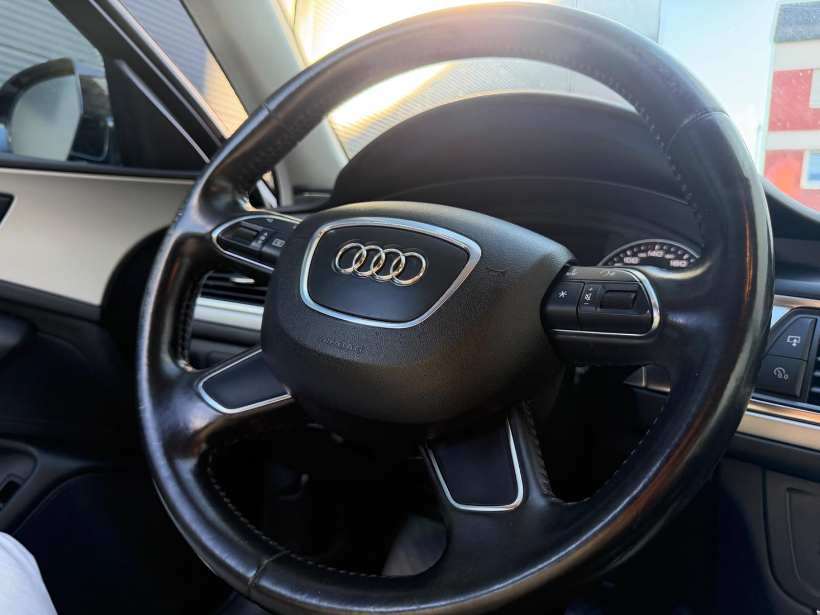 Audi A6 2012 — photo 16