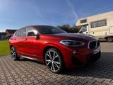 BMW X2 xDrive20i M Sport Steptronic M Sport - BMW mit Benzin-Antrieb: Orange
