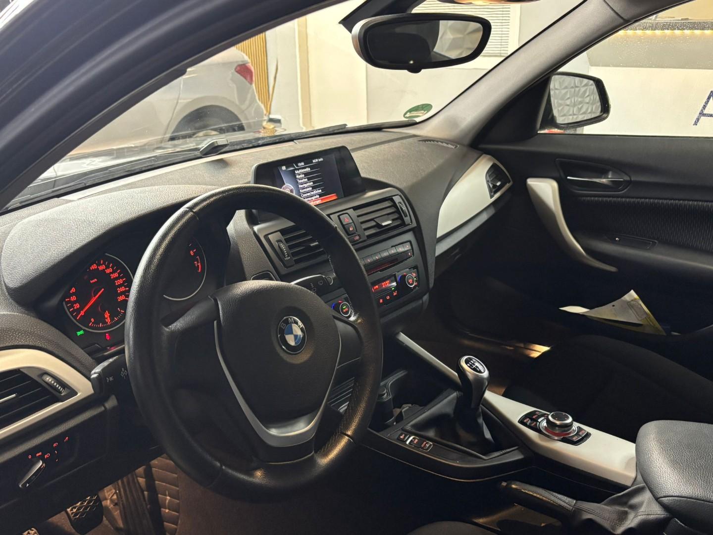 BMW 114 2014 — photo 14