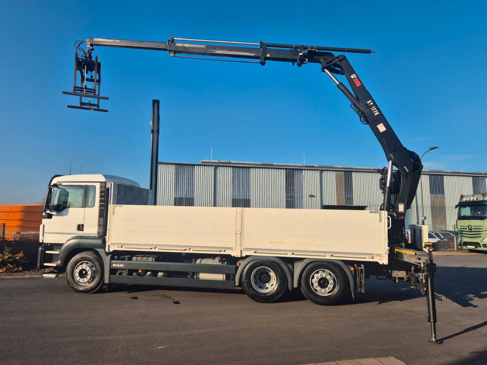 Fahrzeugabbildung MAN TGS 26.460 6x2 Baustoff / Hiab 177 K