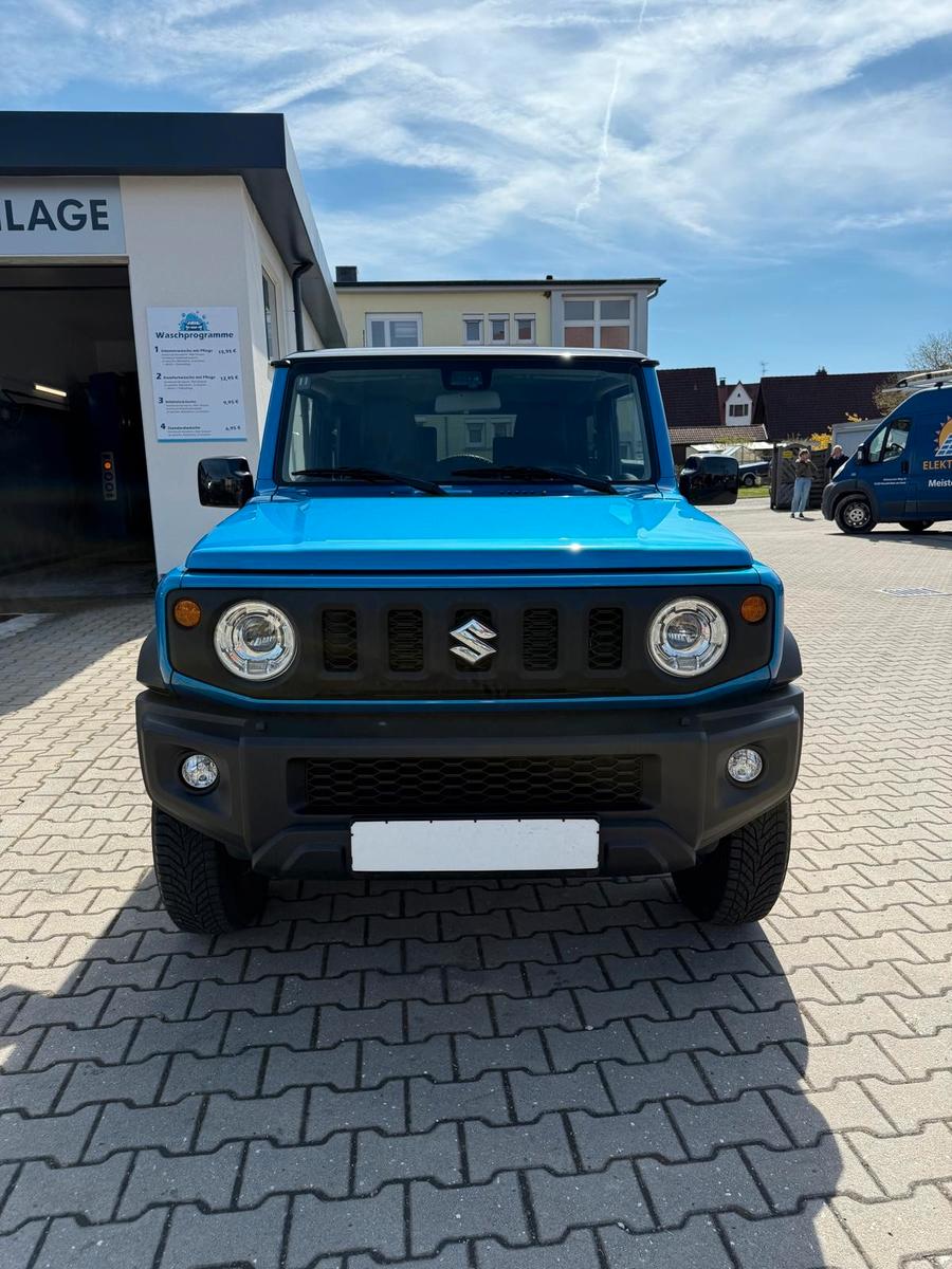 Suzuki Jimny Comfort AllGrip NAVI SHZ 5-GANG SCHECKHEFT