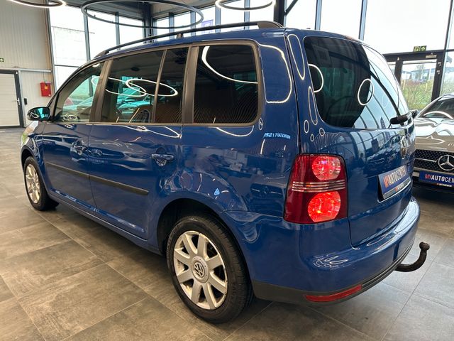 Volkswagen Touran  *7Sitzer*Navi*DSG*Sitzh*BiXenon*