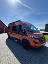 Malibu 600DB - orange Wohnmobil oder -wagen