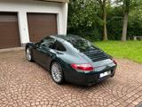 Porsche 997 Carrera S Coupé, tannengrün, 2.Hd.   - Porsche 997 mit Schiebedach