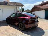 Tesla 2024 Model Y Long Range RWD mit 622KM Reichweite - rote Tesla Model Y