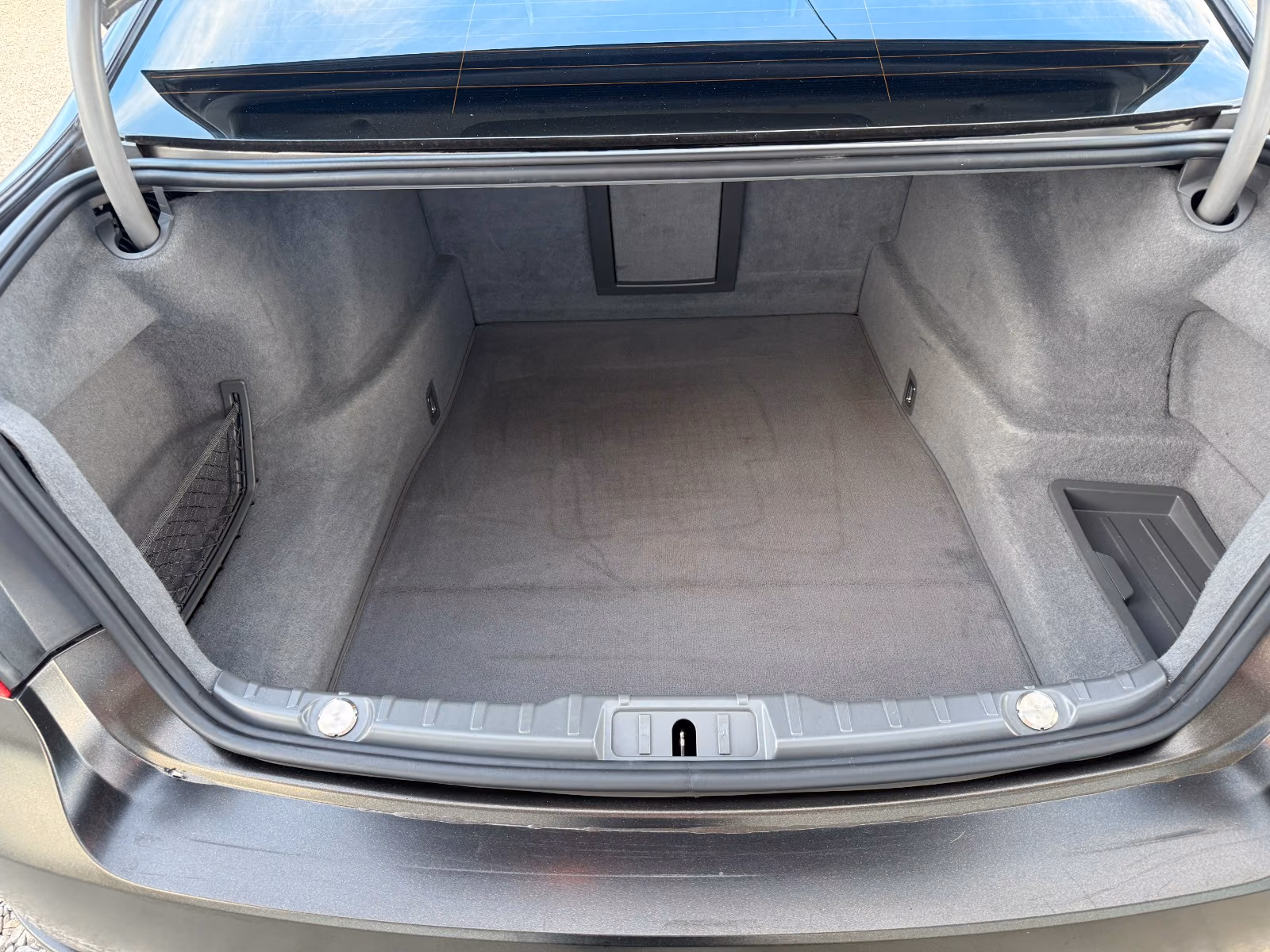 BMW 740i | 326 ch | BVA | Affichage tête haute | Régulateur adaptatif | Sièges ventilés/massants | Chauffage auxiliaire | TV / divertissement arrière