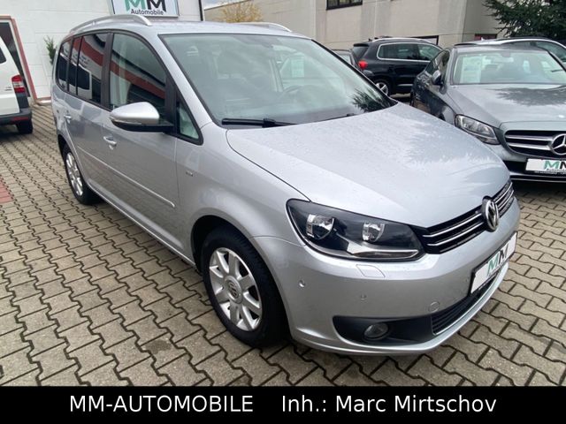 Volkswagen Touran 1.6 TDI Cup-2.HAND-NAVI-7.SITZER-PDC-SHZ