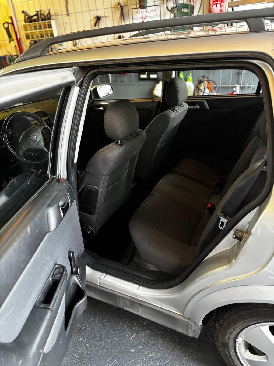 Opel Astra 2004 — photo 13