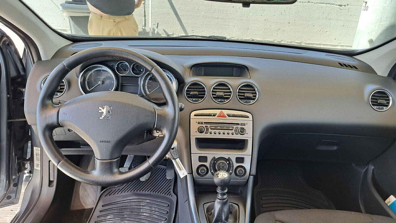 Peugeot 308 2009 — photo 9