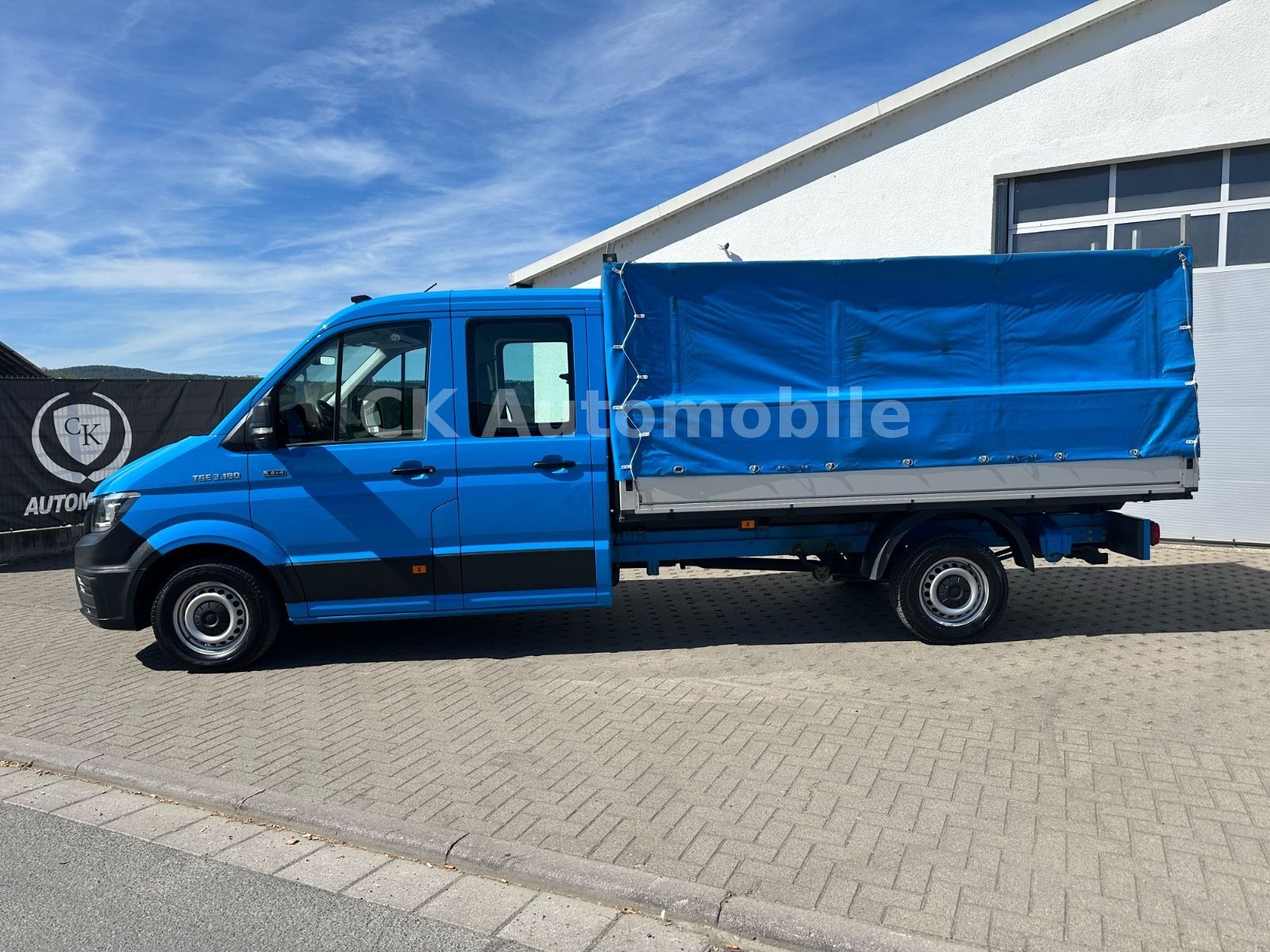Fahrzeugabbildung MAN TGE 3.180 DoKa Pritsche/Plane 4X4/6 Sitze/AHK