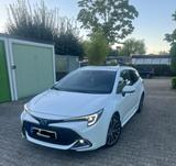 Toyota Corolla 2,0 Hybrid Team Deutsch Touring Spor... - Toyota Corolla Gebrauchtwagen in München