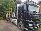 MAN TGX 26.580 6x4 Holztransporter mit Tajfun L120Z