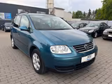 Volkswagen Touran 1.6 FSI 7 Sitze Automatik - Volkswagen Touran mit Benzin-Antrieb: Kleinbus, Automatik, 1.6