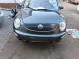 Volkswagen VW Beetle dark flint - Volkswagen Beetle aus 2005: Cabrio