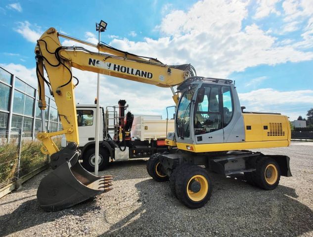 New Holland WE 190  5790mth , 2 excavator buckets