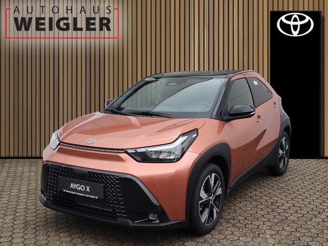 Toyota Aygo Aygo X Hybrid Teamplayer*PDC*Kamera*Carplay* — 24.990 € bei Autohaus Weigler Leverkusen