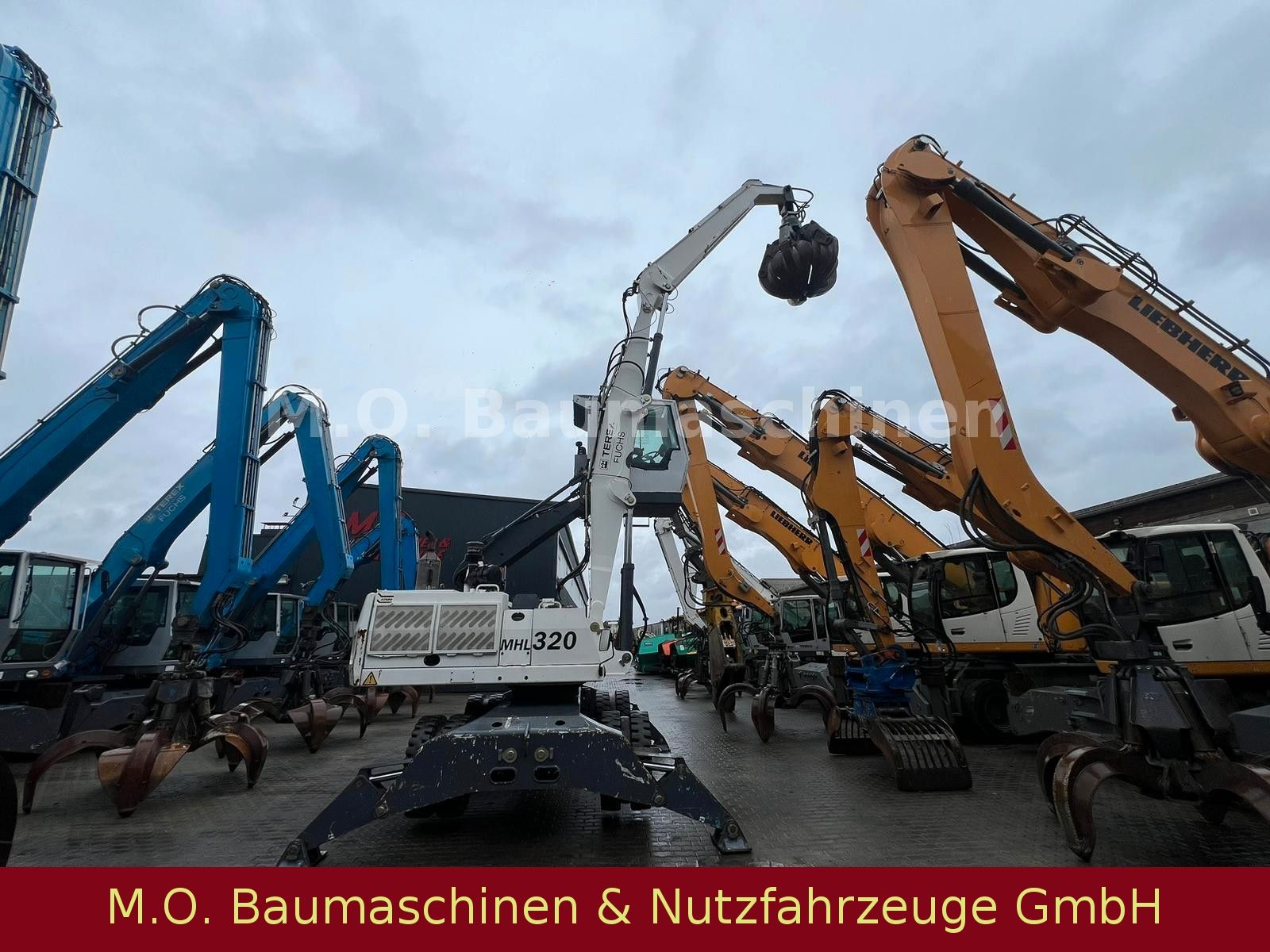 Fahrzeugabbildung Fuchs Terex MHL 320 / Polyp/ Liftkabine/