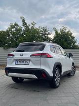Toyota Corolla Cross 2.0-l-VVT-i Hybrid Lounge Allr... - Toyota Corolla Cross: Lounge