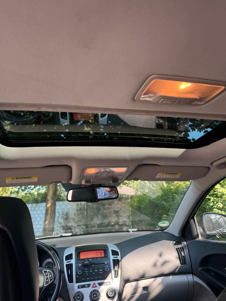 Kia cee'd 2009 — photo 8