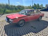 Audi 100 mit H-Zulassung - rote Audi 100