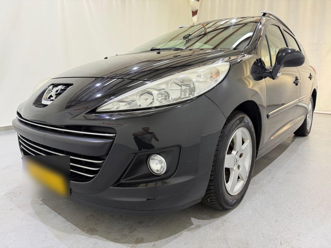 Peugeot 207 2010 — interior
