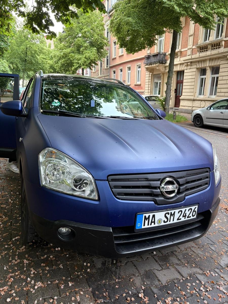 Nissan Qashqai+2 2009 — rear view