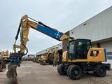 CAT M318F - CAT Mobilbagger 318