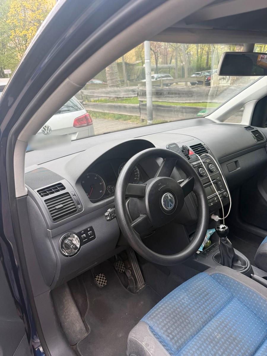 Volkswagen Touran 2005 — engine 105 HP (77kW)