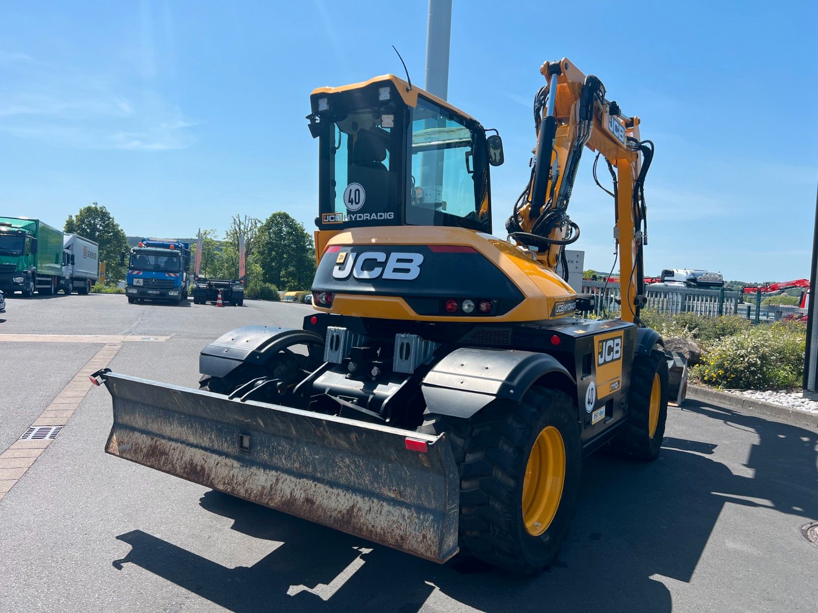 Fahrzeugabbildung JCB Hydradig 110W / Pratzen / nur 179h / Löffelpaket