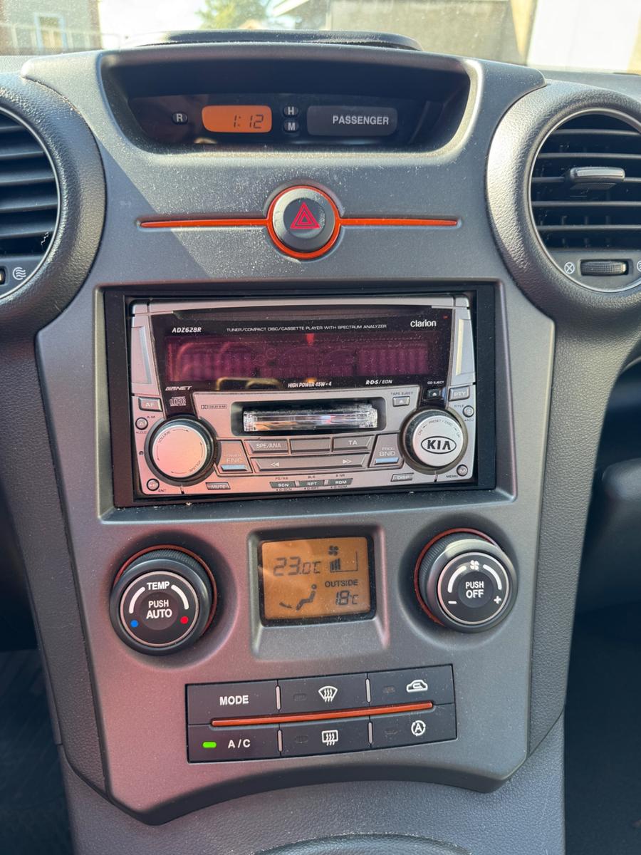 Kia Carens 2006 — photo 11