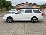Skoda Octavia 2.0 TDI Combi *1 HAND *NAVI *XENON - Skoda Octavia aus 2012 mit Diesel-Antrieb: Kombi