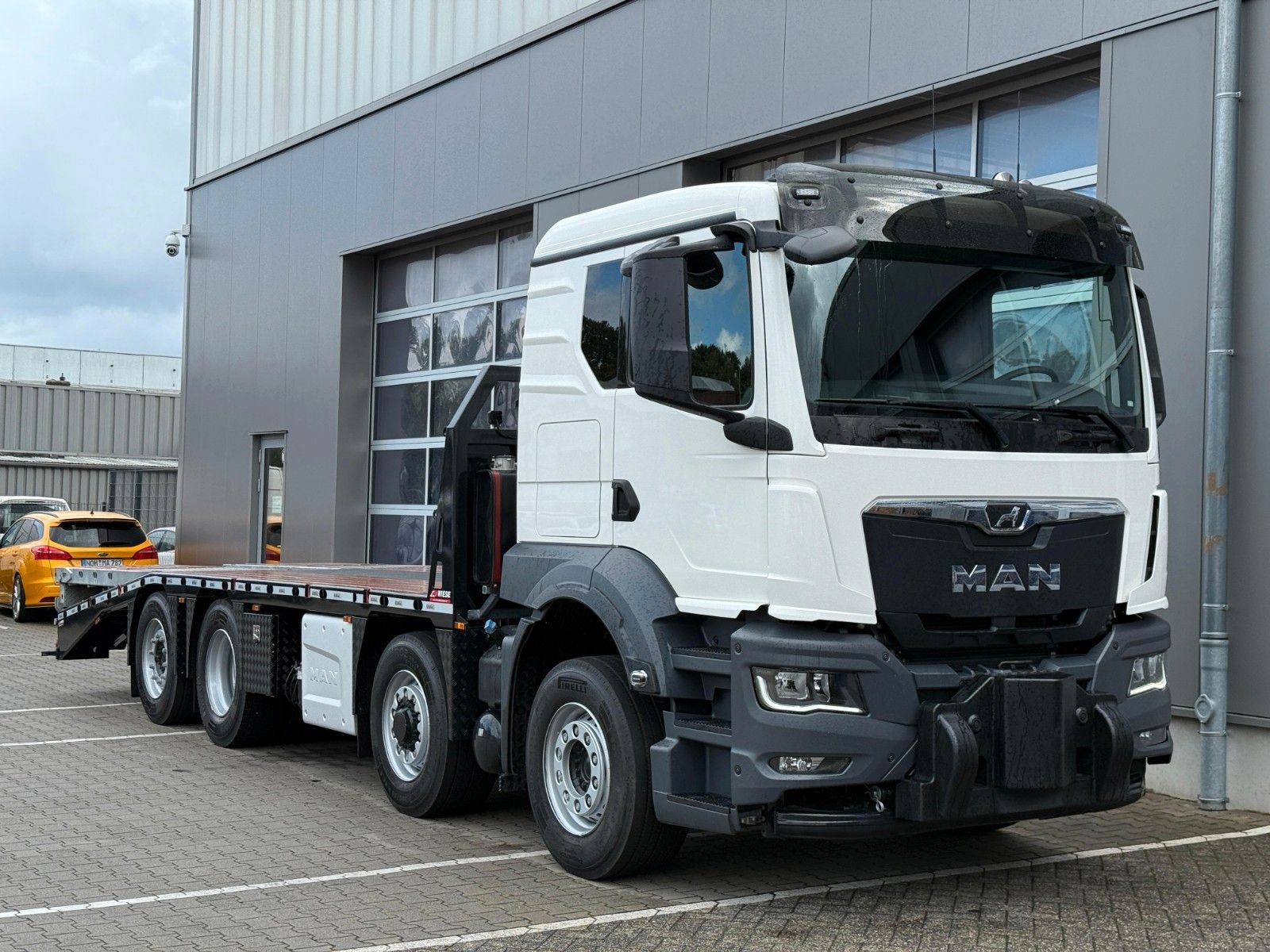 Fahrzeugabbildung MAN TGS 35.520 8x2H Maschinentransporter Funk* Seil*