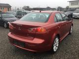 Mitsubishi Lancer Lim. Inform - rote Mitsubishi Lancer