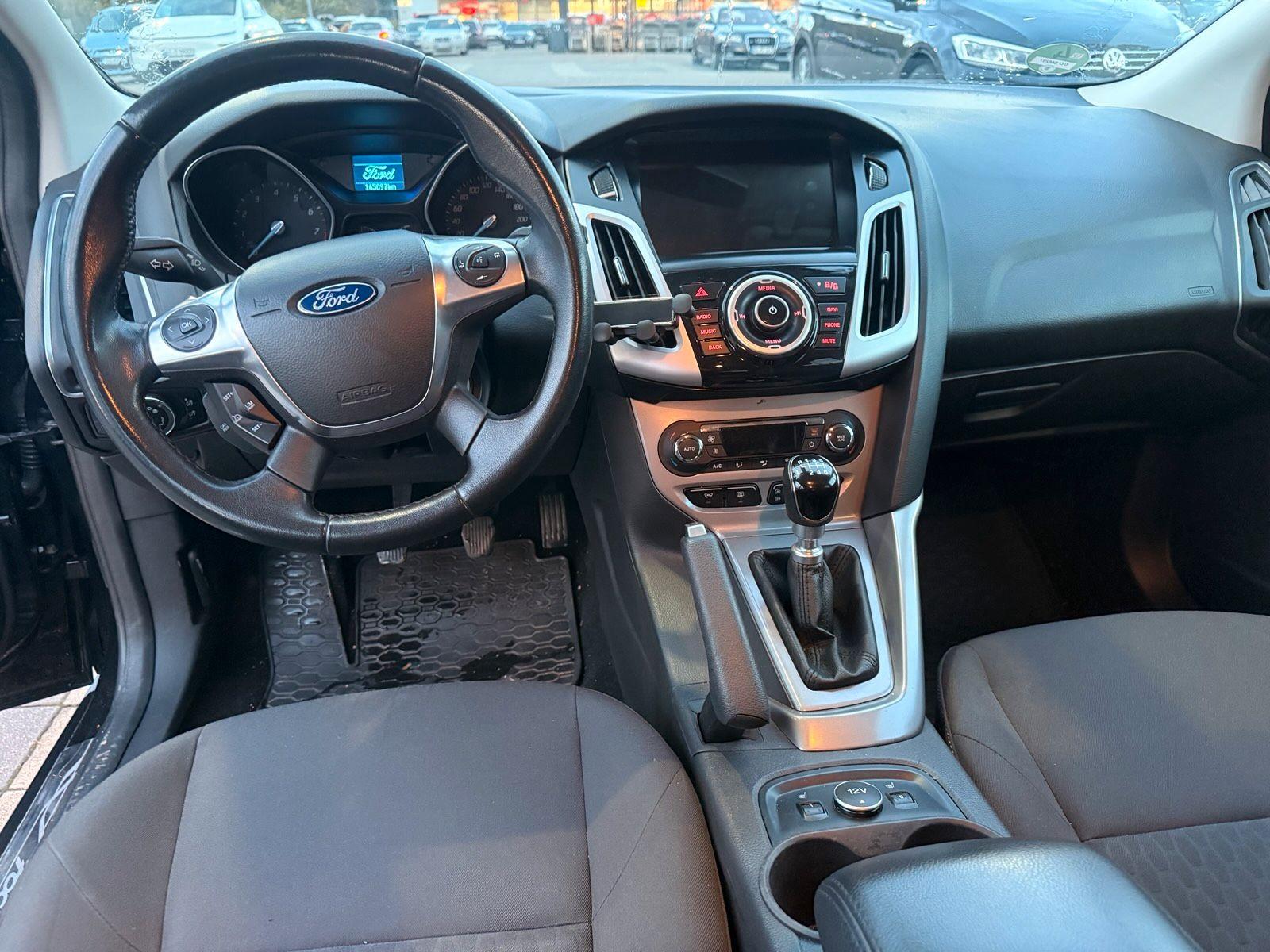Ford Focus 2014 — engine 125 HP (92kW)