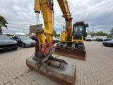 Komatsu PC138US-11 - Kehrmaschine