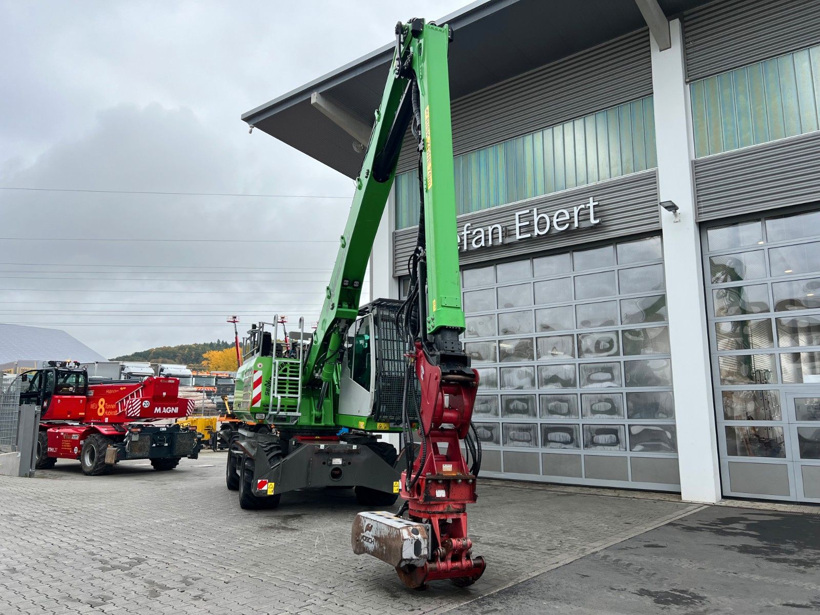 Fahrzeugabbildung Sennebogen 718 / inkl. Vosch Fällzange / nur 1.965h!