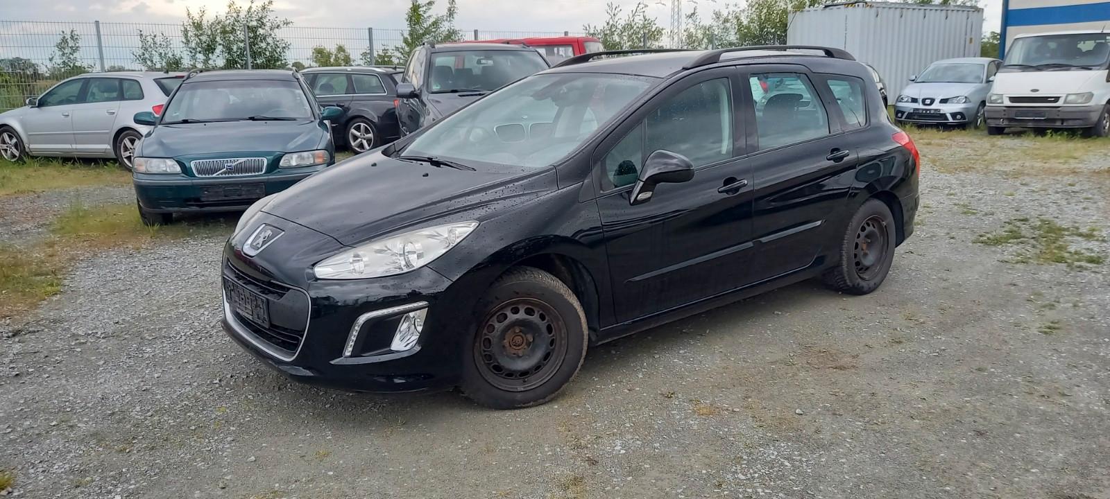 Peugeot 308 2014 — rear view