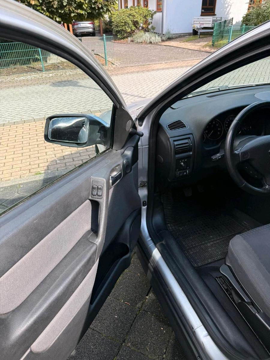 Opel Astra 2004 — photo 13