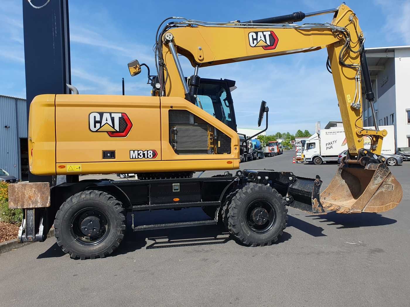 Fahrzeugabbildung CAT M318 / 2022 / nur 286h! / Tieflöffel / Pratzen