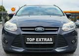 Ford Focus Turnier 1.6 TDCi*SITZH*NAVI*AHK*ZAHNR.-NEU - Ford Focus mit Diesel-Antrieb: Kombi, 1.6