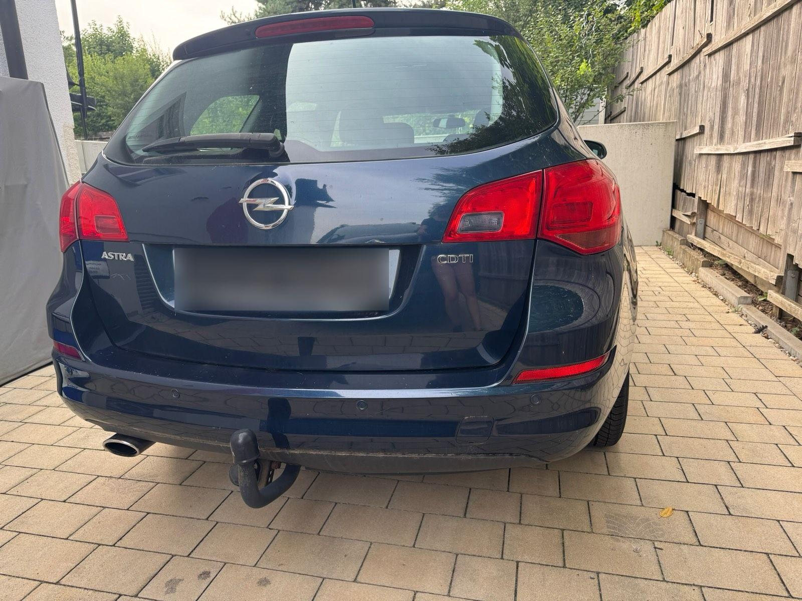 Opel Astra 2011 — engine 165 HP (121kW)