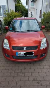 Suzuki Swift 1.3 Comfort - Suzuki Swift mit Benzin-Antrieb: Orange, Limousine
