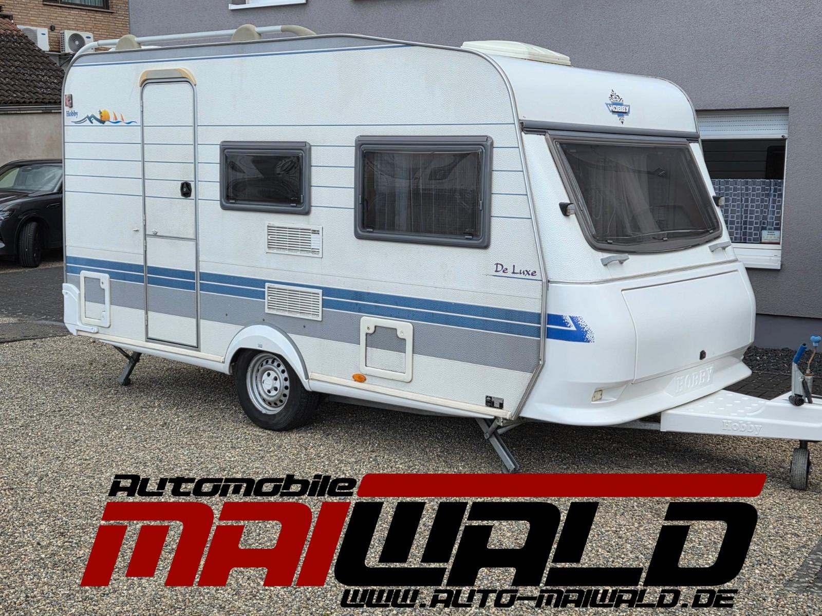 Hobby de luxe 400, 100km,  4Pers., Zelt, Reifen NEU