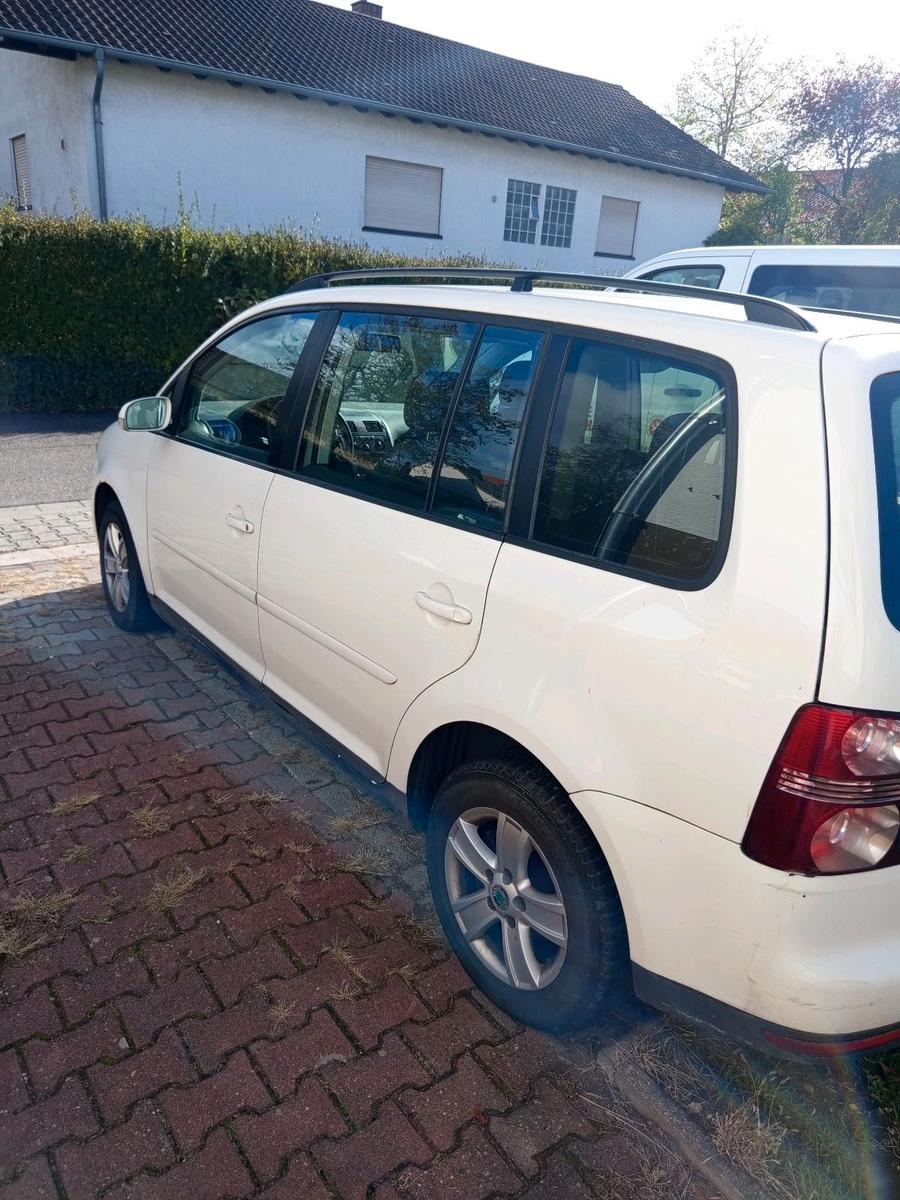 Volkswagen Touran 2007 — engine 105 HP (77kW)