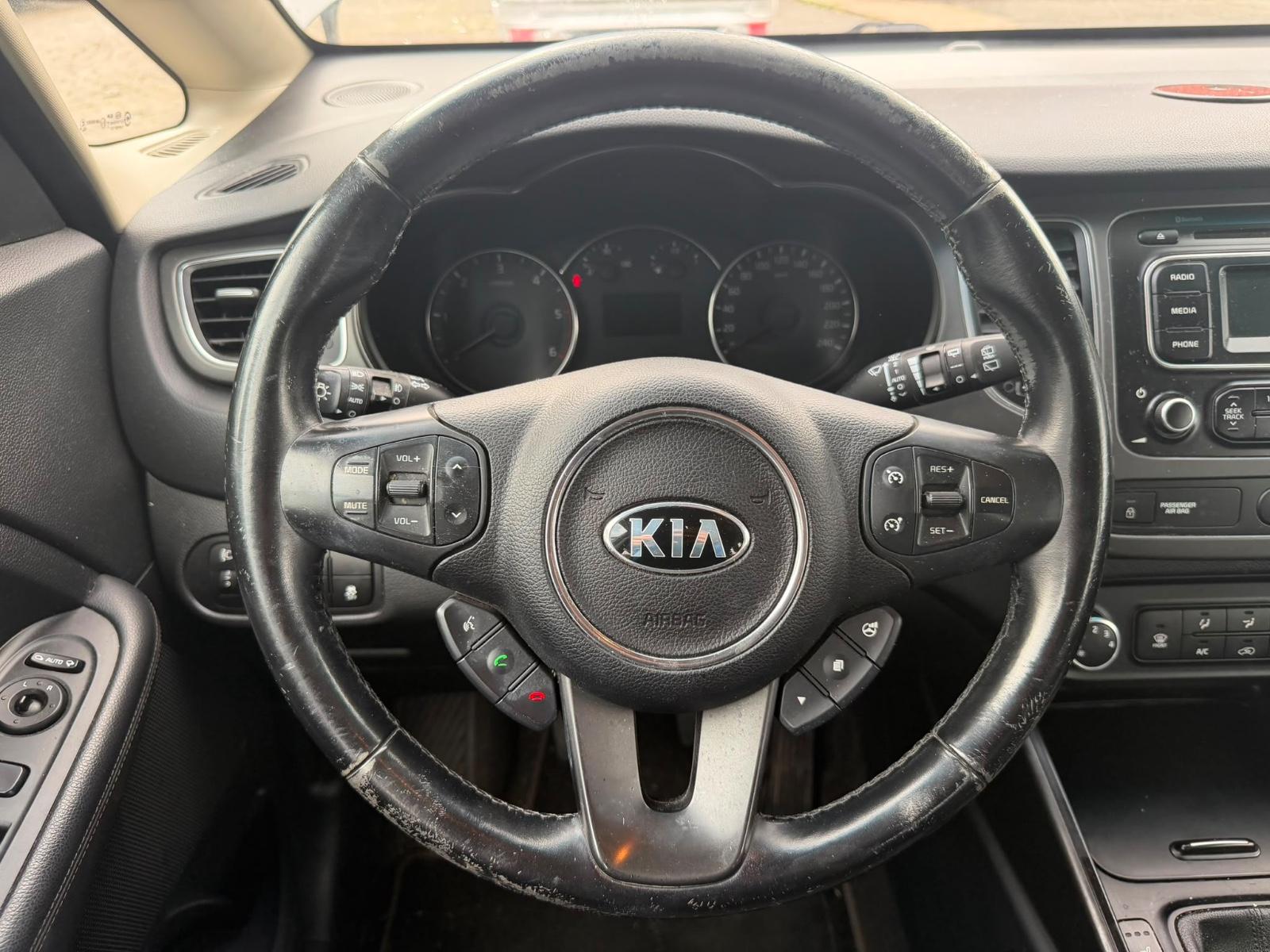 Kia Carens 2014 — photo 13